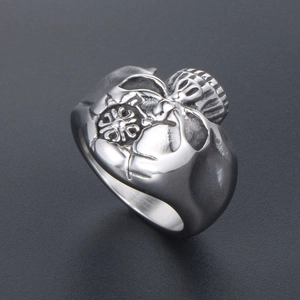 Vintage stainless steel Claddagh ring with hands holding a heart and crown relief