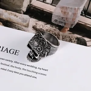 Retro steampunk skull ring in stainless steel with mechanical gear relief textures