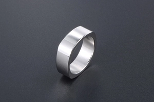 Close-up of minimalist silver stainless steel square-shaped ring for men with polished finish