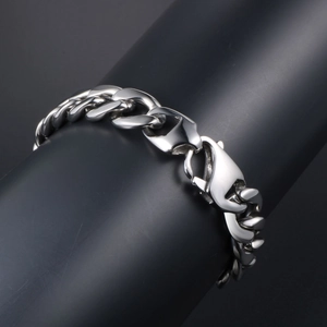 Polished stainless steel punk Cuban link bracelet with skull wings and lobster clasp