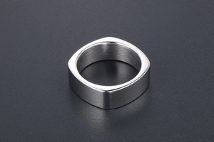 Top view of square men's ring with polished exterior and brushed metal interior