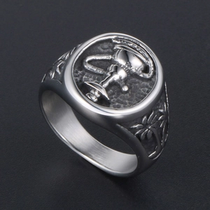 Retro stainless steel signet ring with engraved palm trees and central chalice symbol