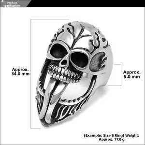 Detailed view of punk skull ring with long tongue and dimensions of 34mm height