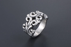 Detailed view of punk style titanium steel ring featuring intricate vintage floral patterns