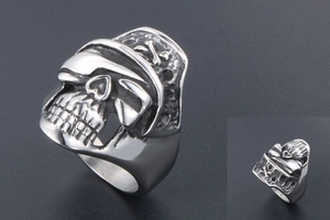Detailed close-up of retro punk skull ring with pirate hat in vintage titanium steel