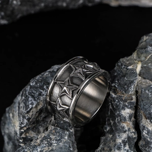 Wide band titanium steel ring with 3D embossed five-point star pattern in vintage silver