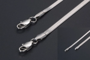 Macro shot of silver flat snake chain with durable lobster clasp and refined metal finish