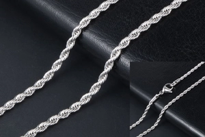 Detailed close-up of a silver polished stainless steel rope chain with lobster clasp