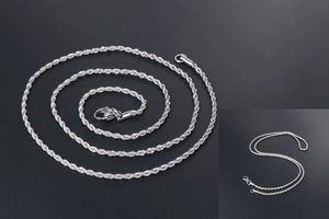 Close-up of silver stainless steel rope chain necklace with classic lobster clasp closure