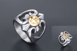 Macro view of vintage punk eagle crest on a gothic style stainless steel men's ring
