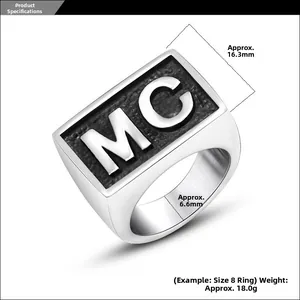 Detail view of silver men's signet ring with MC engraving and 16.3mm face width