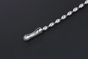 Macro shot of silver stainless steel bead chain with professional metal connector clasp