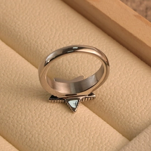Titanium star ring featuring polished silver finish and brushed inner metal band