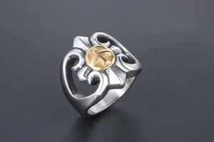 Macro view of vintage punk eagle ring with golden emblem and intricate side carvings