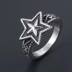 Detailed view of titanium steel star ring featuring vintage scroll textured engraving
