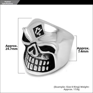 Detail view showing dimensions and 1% logo of retro punk rock skull ring in stainless steel