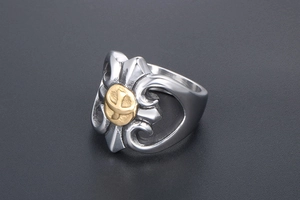 Detailed view of punk style silver steel ring featuring a golden eagle totem emblem