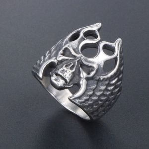 Vintage punk skull ring in polished stainless steel with detailed side wing textures