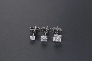 Three square-cut zircon stud earrings in varying sizes with polished titanium steel bases