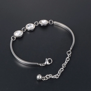 Fashionable titanium steel bracelet for women featuring three clear crystals and lobster clasp