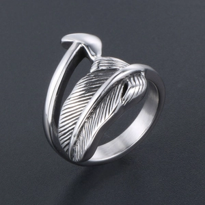 Silver titanium steel feather and mushroom ring with detailed nature inspired engraving