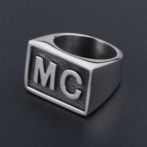 Men's polished stainless steel signet ring with embossed MC letter on a flat rectangle