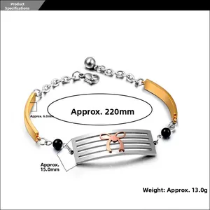 Detailed view of tri-color metal bracelet with rose gold bow and dimensions marking