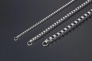 Three different thicknesses of silver box chains made of polished stainless steel metal