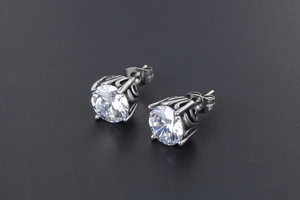 Detailed view of vintage titanium steel stud earrings with large round cut zircons
