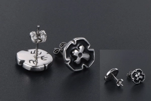 Detail of 316L stainless steel cross stud earring with black oil drip finish