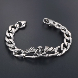 Bracelet rétro en acier avec crâne et ailes de mort sur une chaîne cubaine punk