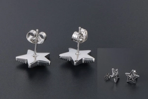 Detail of star-shaped titanium steel studs featuring retro relief texture and butterfly backs