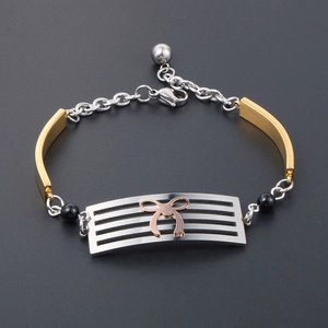 Fashion gold plated stainless steel bracelet featuring bowknot metal plate and black beads