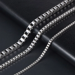 Titanium steel box chains in three widths for men and women on black background