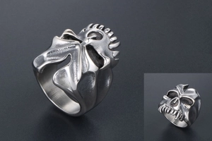 Detailed macro view showing the vintage gothic monster skull ring with aged silver finish