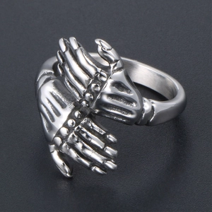 Vintage punk silver stainless steel ring featuring two hands holding each other in detail