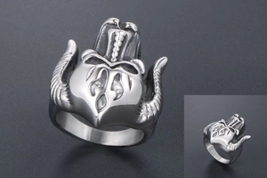 Detailed view of silver punk ring featuring a horned demon head and intricate gothic textures