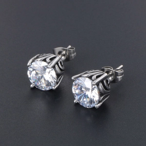 Retro titanium steel stud earrings with brilliant round cubic zirconia and ornate hollow design
