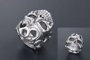 Detailed macro view of vintage gothic silver skull ring with intricate engraving