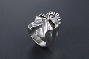 Macro detail of gothic skull ring with vintage distressed silver finish for men