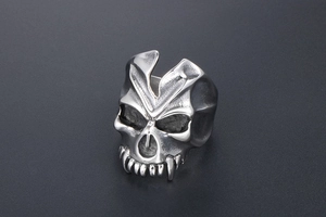 Macro shot of gothic skull ring with vintage distressed finish and detailed bone texture