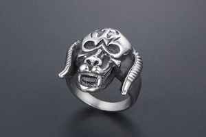 Macro detail of gothic bull horn monster ring in silver-tone stainless steel finish