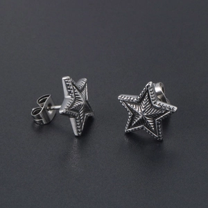 Vintage star earrings in silver titanium steel with textured sunburst pattern and butterfly back