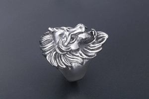 Detailed view of punk lion head ring featuring matte silver stainless steel textures