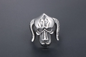 Detailed view of retro stainless steel ring with gothic ram skull and horn design