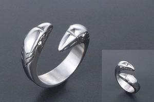 Detailed view of adjustable stainless steel ring with Gothic eagle head carvings