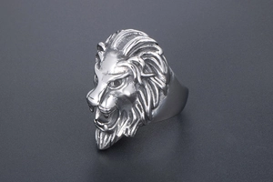 Detailed close-up of a vintage lion head ring crafted from durable silver steel