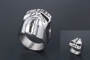 Detailed view of industrial gear style stainless steel ring with metallic highlights