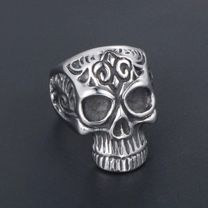Vintage gothic skull ring in stainless steel with embossed floral vine engravings