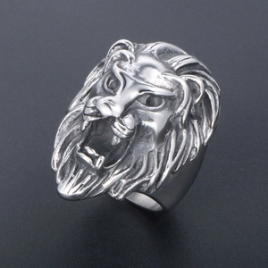 Mens stainless steel lion head ring with detailed roaring design on grey background
